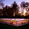 Wedding Catered at night inside tent with full setup